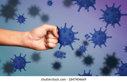 Be healthy - boost your immunity to fight with illness. Man showing clenched fist surrounded by viruses, closeup - Shutterstock ID 1847404669