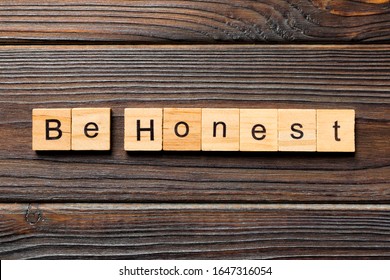 Be Honest Word Written On Wood Block. Be Honest Text On Table, Concept.