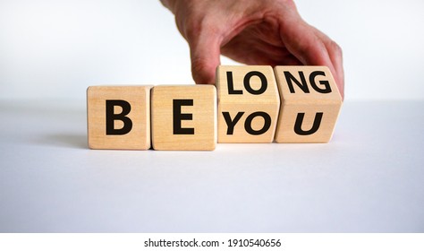 Be you, belong symbol. Businessman hand turns cubes and changes words 'be you' to 'belong'. Beautiful white background. Business, belonging and be you, belong concept. Copy space. - Shutterstock ID 1910540656