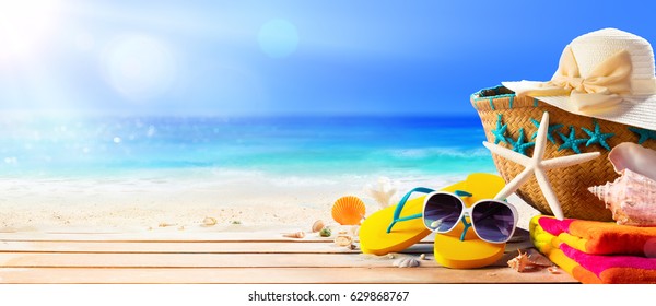 Beach Accessories On Table On Beach - Summer Holidays
