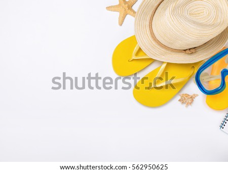 Beach accessories on white background, vacation and travel items, top view