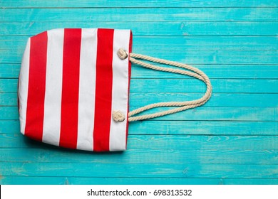 Beach accessories on wooden table. - Powered by Shutterstock