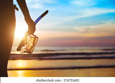 Beach Adventure, Silhouette Of Hand With Equipment For Snorkeling