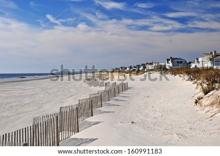 The beach at Avalon NJ. Avalon is part of the upscale resort area of the East coast. It is one of the earliest areas to be developed as a sea resort catering to Philadelphia and New York. 