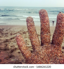 Beach Background With Hand Covered In Sand In Jeju-do, South Korea (square Instagram Format)