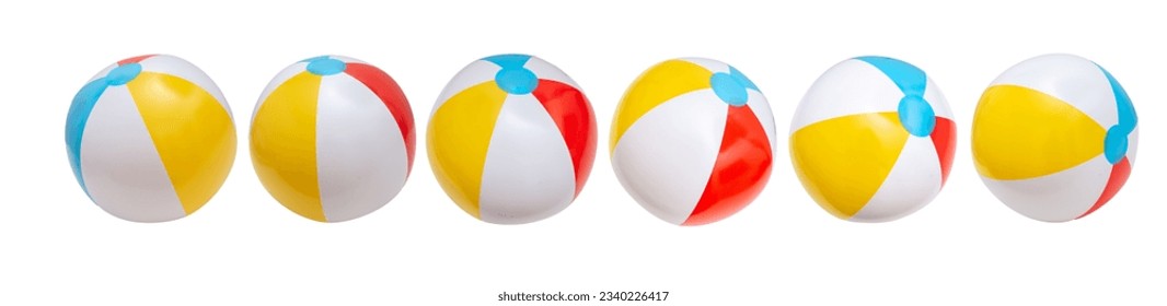 Beach balls in a row isolated on white background, Summer vacations by the sea, kids fun - Powered by Shutterstock