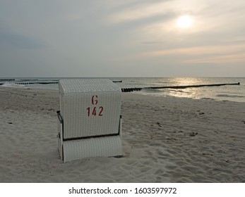 Beach of the Baltic sea at twilight with beach chair, Ahrenshoop, Mecklenburg-Western Pomerania