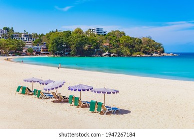Beach Bed and Umbrella on the White Sand Beach in Summer at Kata Beach during Covid-19, Phuket, Thailand