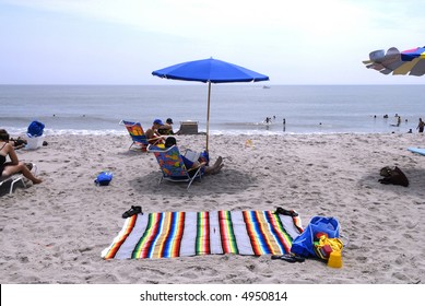 Beach Blanket And Umbrella