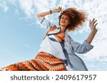 Beach Bliss: Smiling Woman with Backpack, Dancing Freely, Embracing Nature
