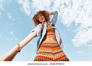 Beach Bliss: A Smiling Woman Enjoying a Happy Vacation, Dancing with Freedom and Joy on the Sand - Powered by Shutterstock