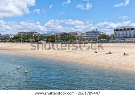 Beach and boardwalk between Eyrac Pier and Thiers Pier at Arcachon, France