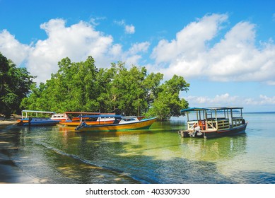 Beach Boats On Bunaken Island In Sulawesi