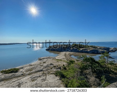 Beach with both sides Water between two Islands in Sweden 