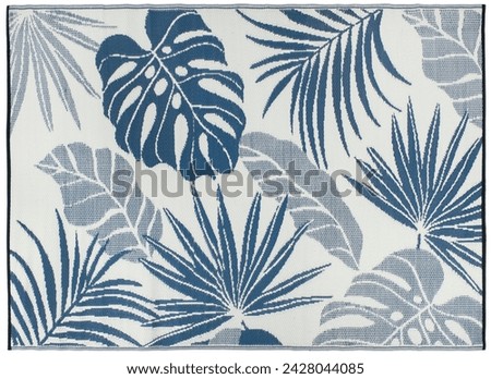 Beach carpet in light blue tones with tropical plant leaves pattern