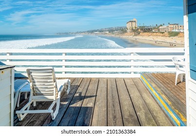 Beach Chair On A Wooden Boardwalk In Pacific Beach, San Diego. California, USA