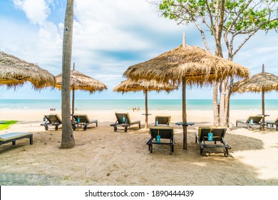 beach chair and umbrella with ocean sea beach background