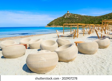 Beach Chairs In A Bar On White Sand Beach, Sardinia Island, Italy