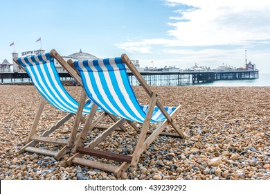 Beach chairs by the pier 