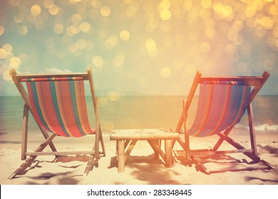 Beach Chairs On Sea Shore With Glowing Bokeh And Film Stylized, Double Exposure Effect