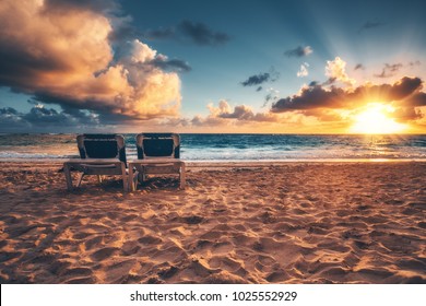 Beach Chairs On The Tropical Carribean Beach And Beautiful Sunrise