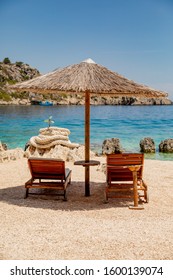 Beach chairs on a tropical beach on Zakynthos, one of the Ionian Islands of Greece
