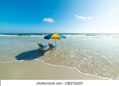 Beach Chairs And Parasol In Daytona Beach. Florida, USA