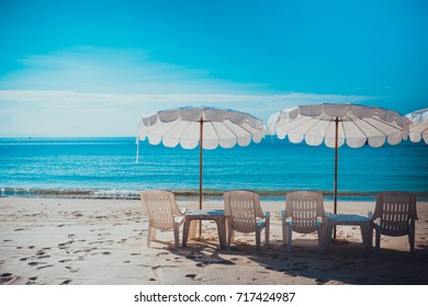 Beach Chairs And Umberella On Tropical Ocean Beach