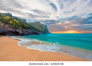 Beach of Cleopatra with sea and rocks of Alanya peninsula - Antalya, Turkey  - Powered by Shutterstock