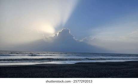  beach with cloudy sky with sun rays