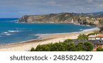 Beach of Comillas from the Monument to the Marquis of Comillas in Comillas, Cantabria, Spain.