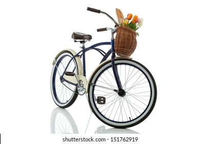 Beach Cruiser With Basket That Has Tulips