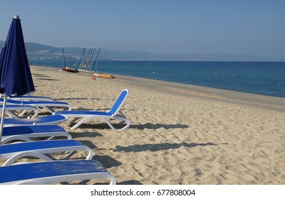 Beach With Deckchairs That Are Not Aligned