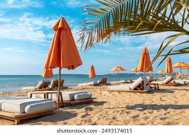 Beach deckchairs with umbrellas on Sunny Beach. Bulgaria