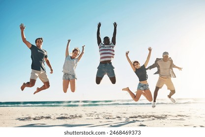 Beach, diversity and group of friends jumping in sky for summer holiday with happiness, youth and excited. Ocean, multicultural and people in air for school reunion with memory, smile and energy - Powered by Shutterstock