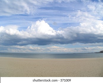Beach with dramatic clouds