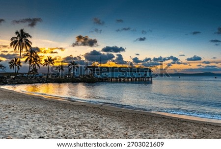 beach dramatic sunset Port Douglas