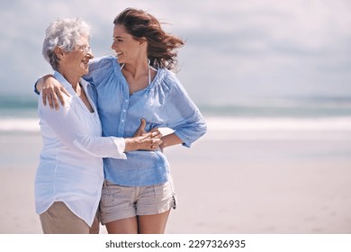 Beach, embrace and senior woman with young woman on the or at the beach together and outdoors. Mockup, happy and hugging elderly woman with adult daughter or at sea for leisure and travel - Powered by Shutterstock