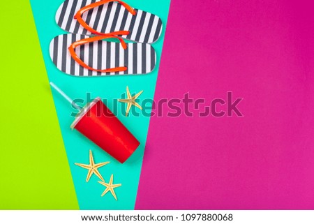 Beach flip flop on color background
