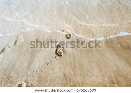 beach with footprint on sand sea