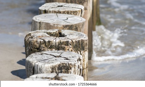 Beach And Groyne By The Sea