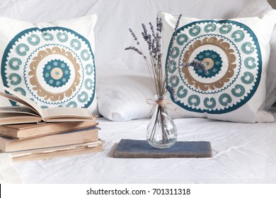 Beach Home Decor With Boho Cushions, Vase With Lavender Flowers And Old Books. Cottage Style Interior Decoration.