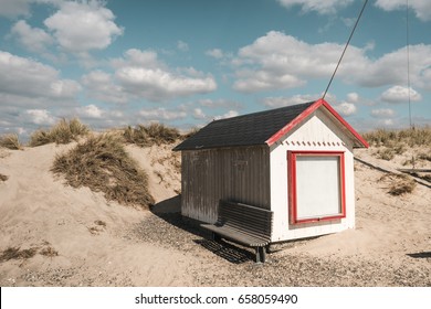 Beach House In Denmark In Sunny Weather With White Clouds 