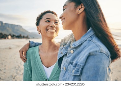 Beach, hug and queer couple with love, lgbtq and happiness with marriage, sunset or adventure. Lesbian, female people or women on a seaside holiday, vacation or quality time with a journey or embrace - Powered by Shutterstock