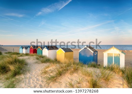Beach huts in sand dunes at Southwold on the Suffolk coast