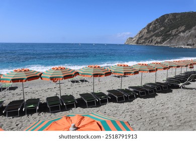 Beach in Italy, Cinque Terre, Beautiful Landscape, Orange, Green, Beach Umbrellas, Ocean, Italy, Background - Powered by Shutterstock