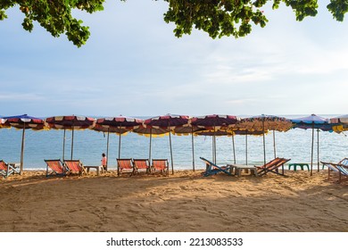 Beach Jomtien Pattaya Thailand During Afternoon Sunset. Beach Chairs On The Beach