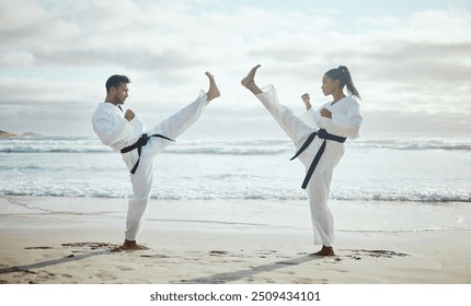 Beach, kick and people with karate, training and fitness with confidence, teamwork and nature. Student, teacher and sensei with girl, skills and talent with martial arts, hobby and ocean with energy