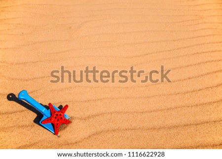 Similar – Shovel and starfish on the beach