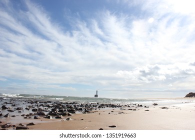 Beach with lighthouse